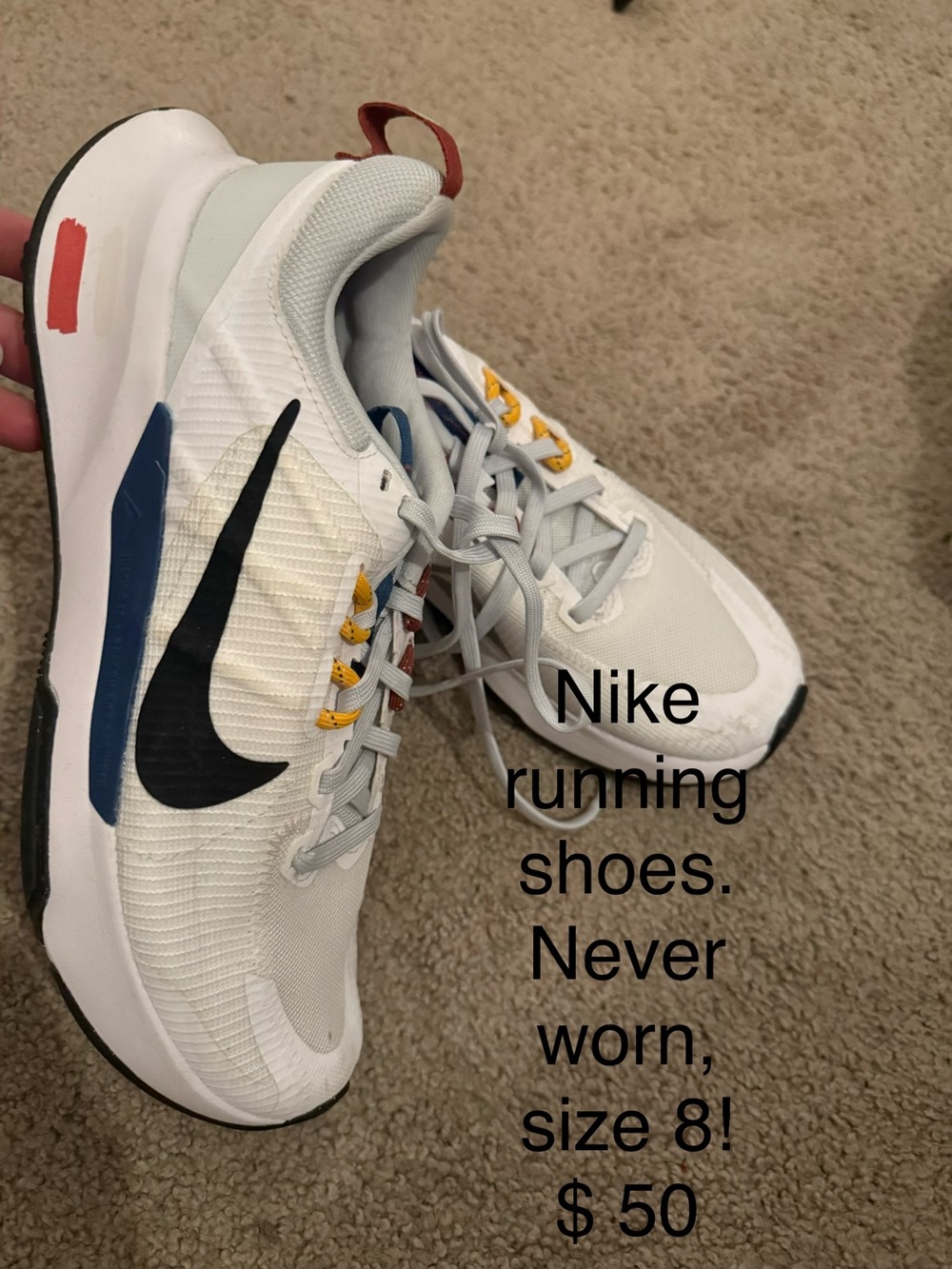 Nike White Running Sneakers with Black Swoosh and Navy Accents
